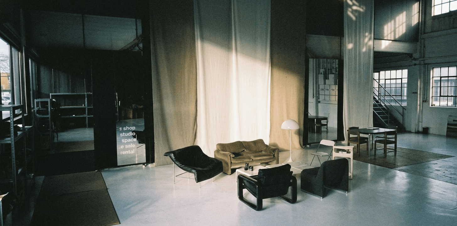 Salon interior with couches — ZNTHWRLD gathering space for emerging creatives